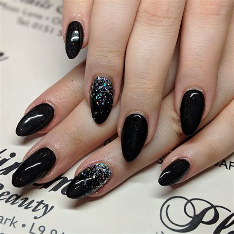 black acrylic nails with glitter